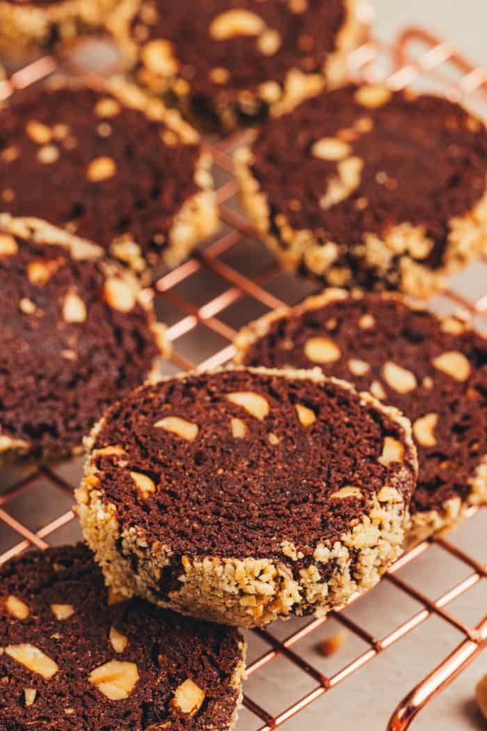 Chocolate hazelnut shortbread cookies on a cooling rack.