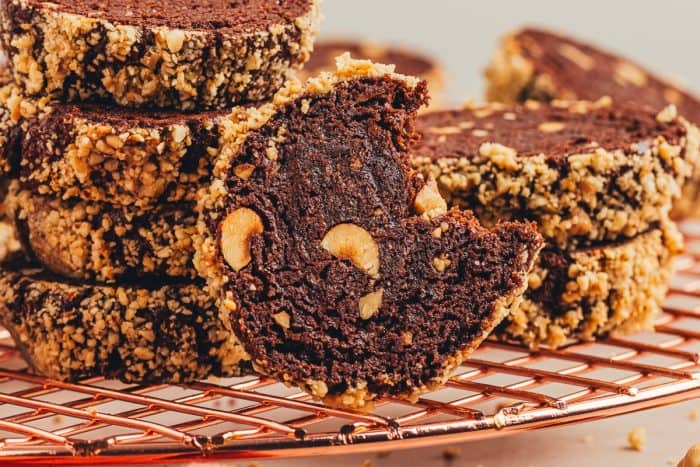 Chocolate hazelnut shortbread cookies on a cooling rake.