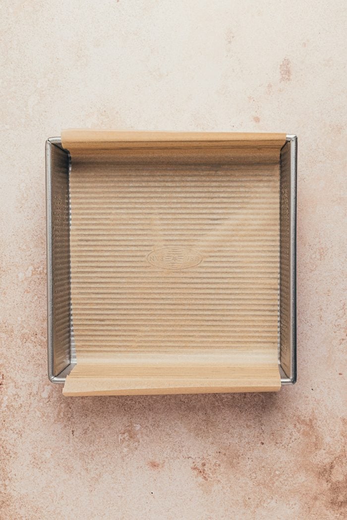 A baking pan with parchment paper.