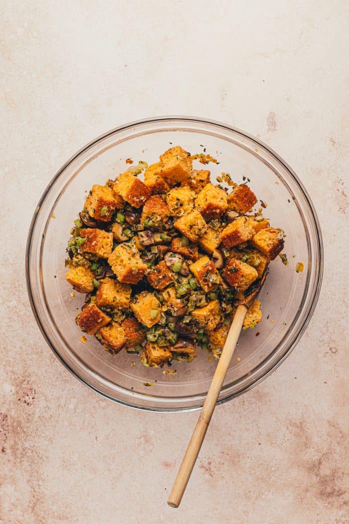 A glass bowl with the cornbread stuffing.