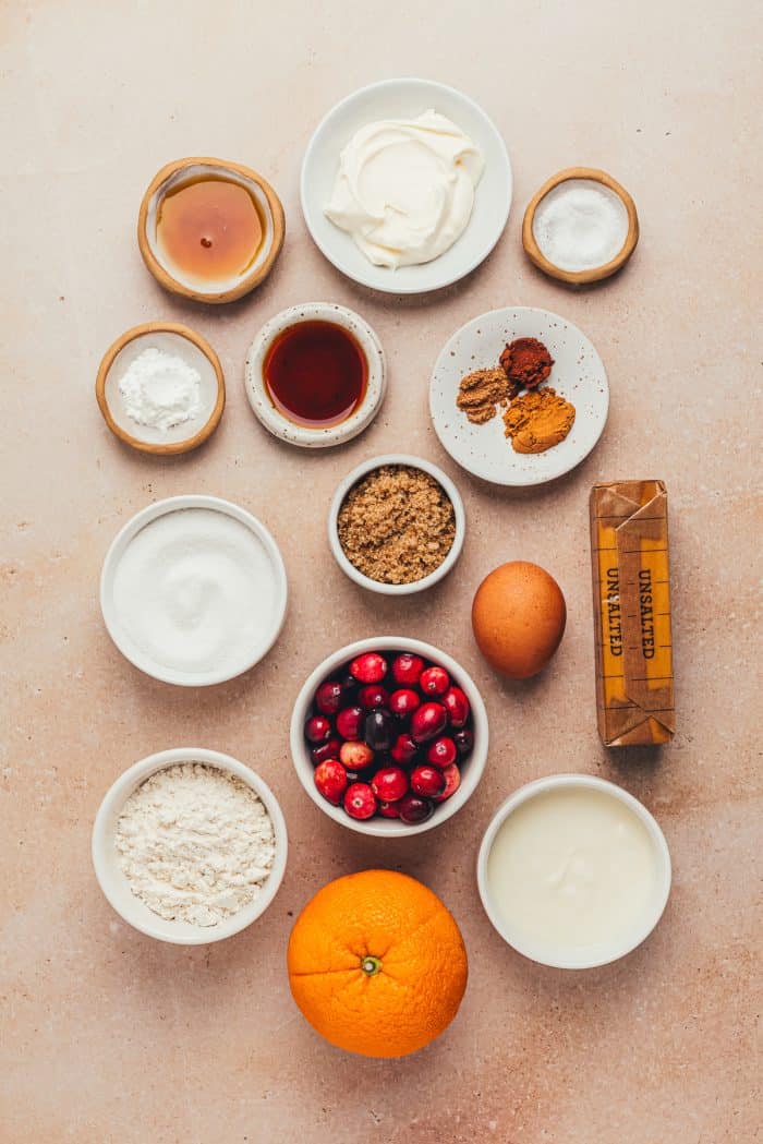 Various bowls of ingredients to make cranberry crumb cake.