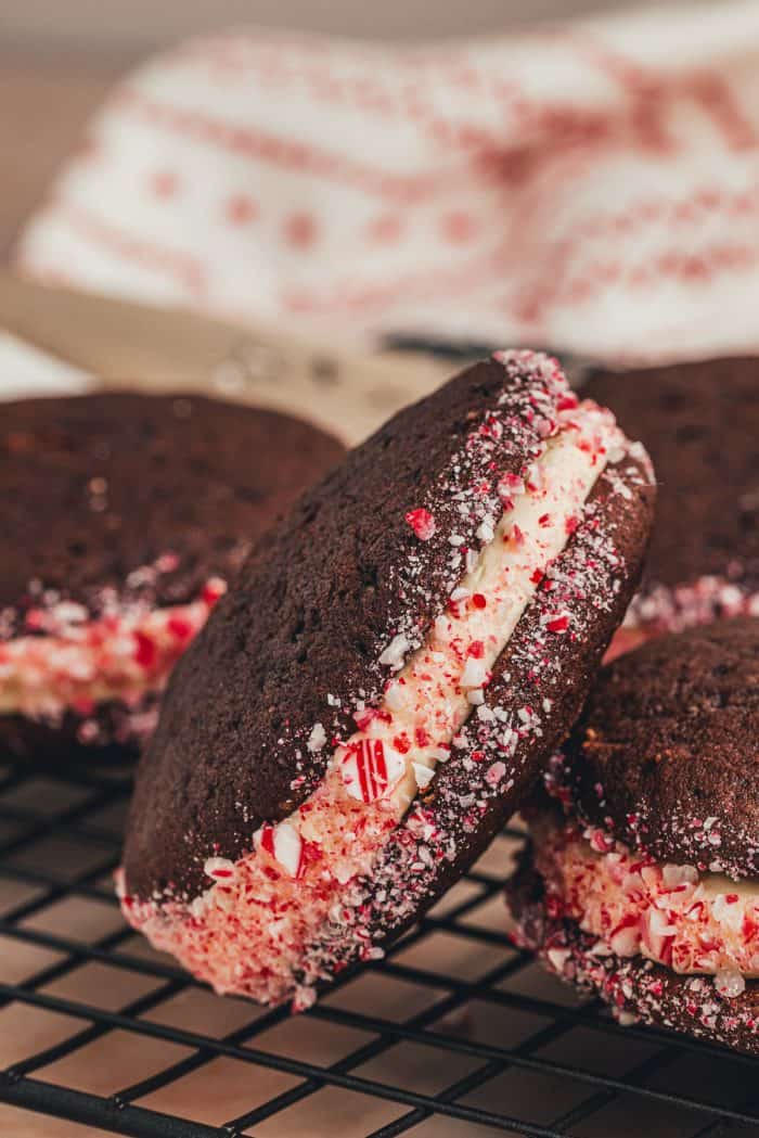 Three chocolate Whoopie pies with crushed peppermint candy.