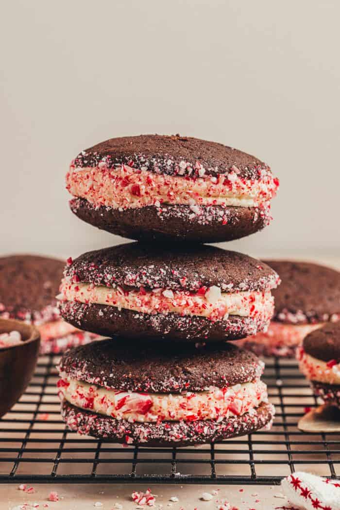 Three chocolate Whoopie pies with crushed peppermint candy.
