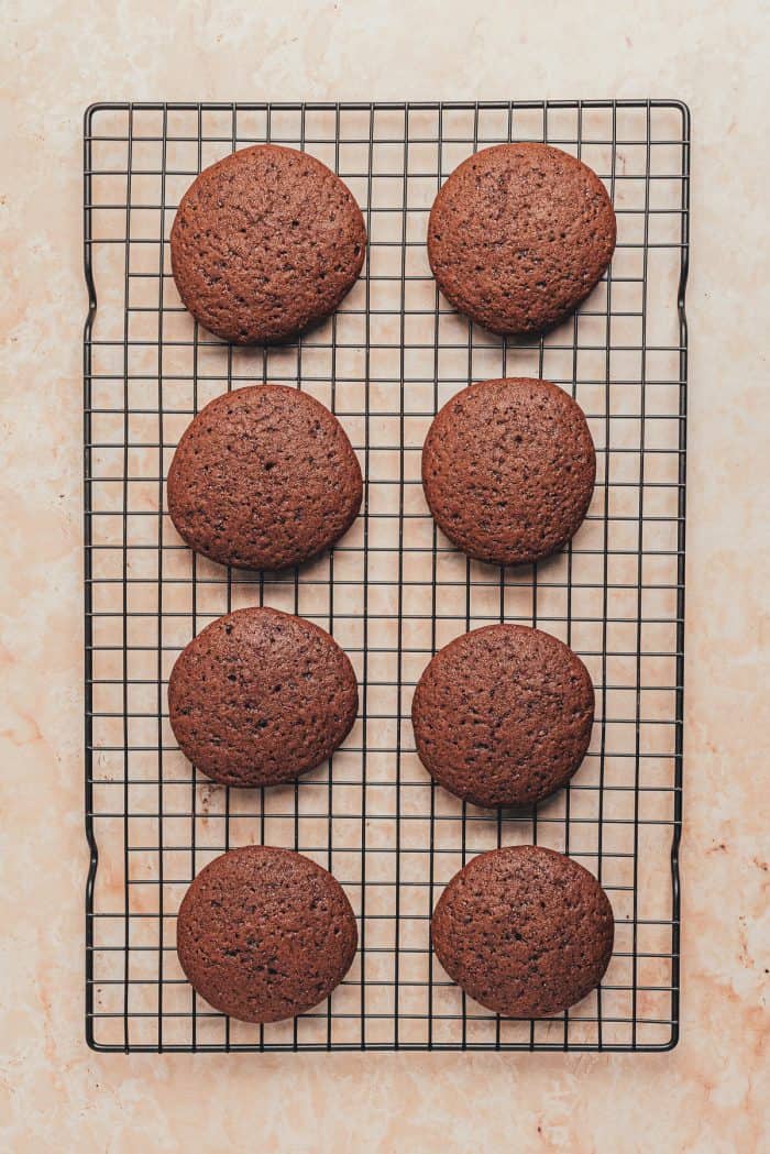 Peppermint Whoopie pies cooling on a cooling rack.