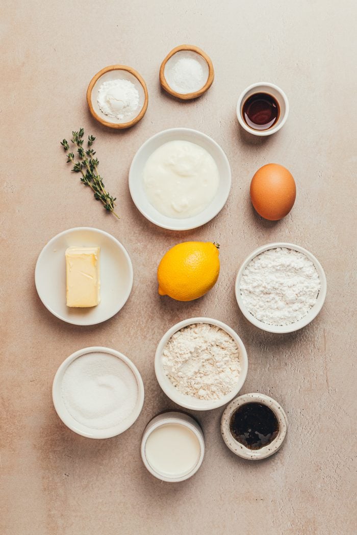 Various bowls filled with the ingredients to make lemon pound cake.