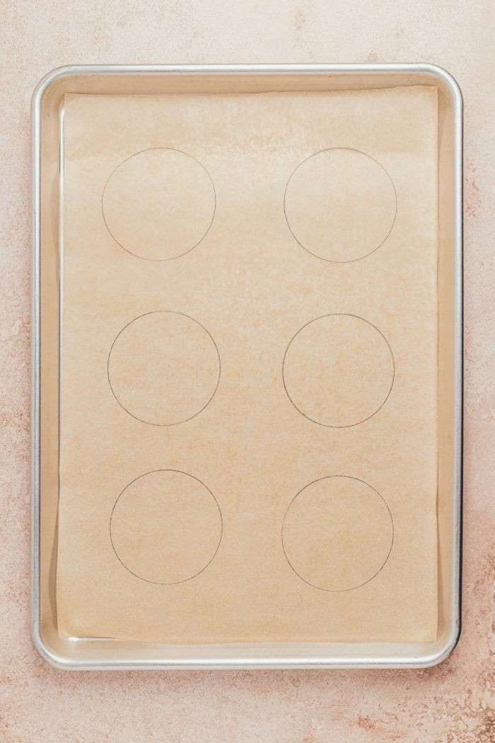 A baking pan with parchment paper.
