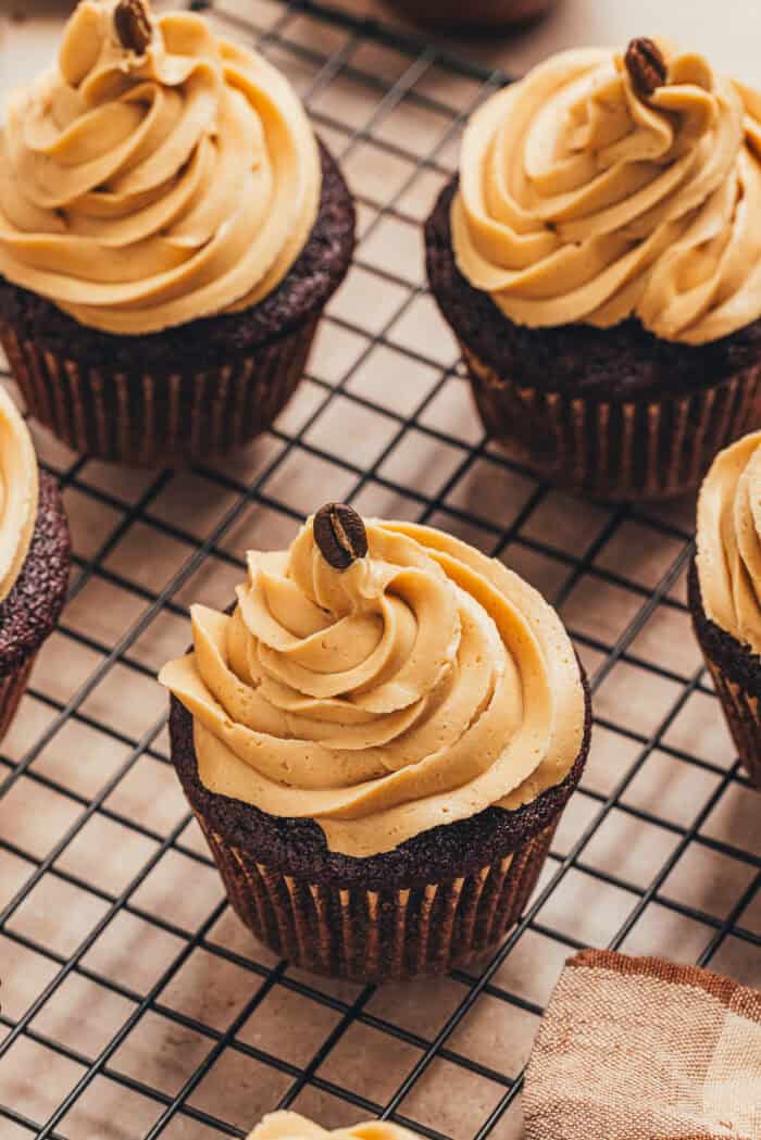 Chocolate espresso cupcakes on a cooling rack.