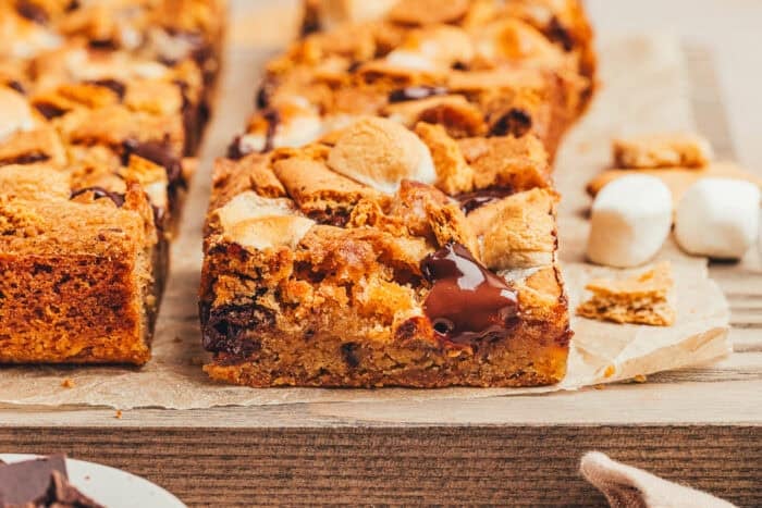 Blondie bars with S'mores toppings sliced into squares.
