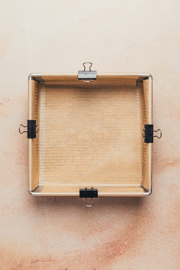 A baking pan, covered in parchment paper.