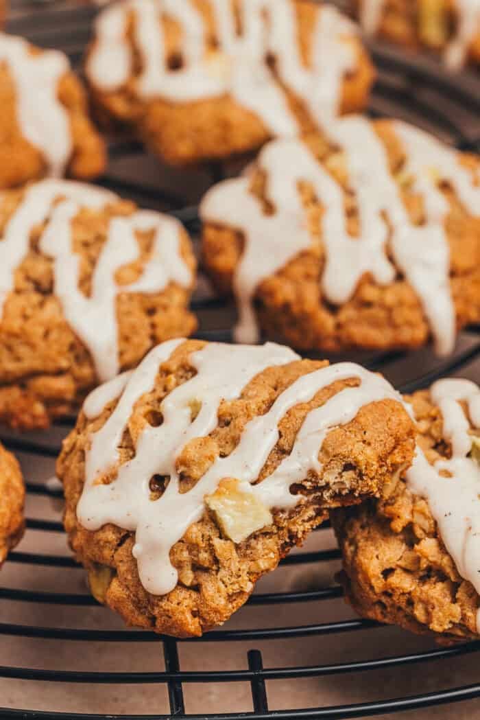 Cinnamon apple oatmeal cookies on a cooling rack.