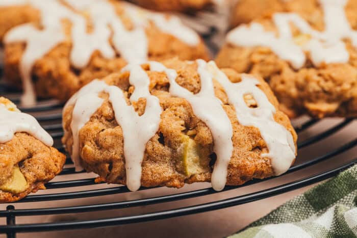 Apple oatmeal cookies on a cooling rack.