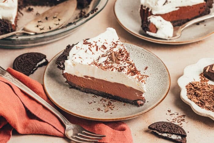 A slice of no bake chocolate pie on a small plate.