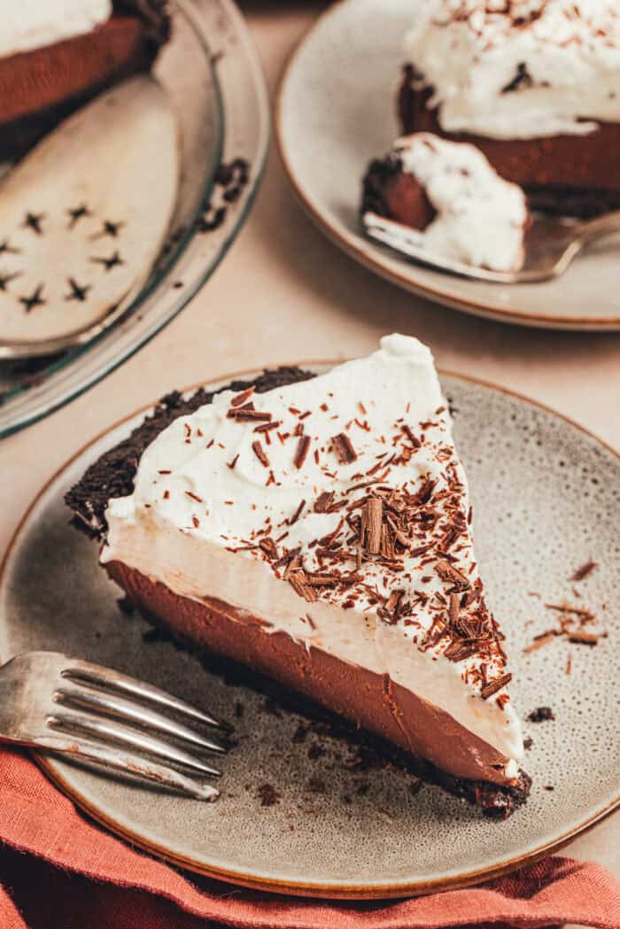 A slice of no bake chocolate pie on a small plate.