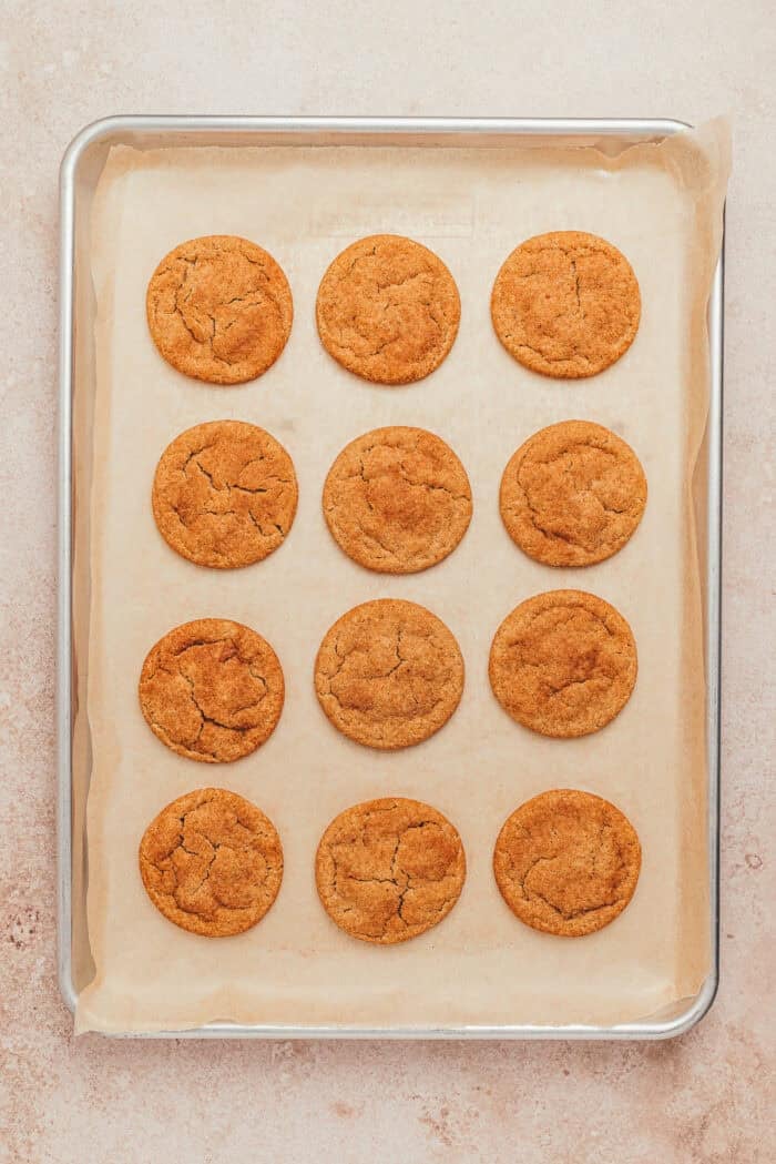 brown butter chai snickerdoodle cookies on a cookie sheet