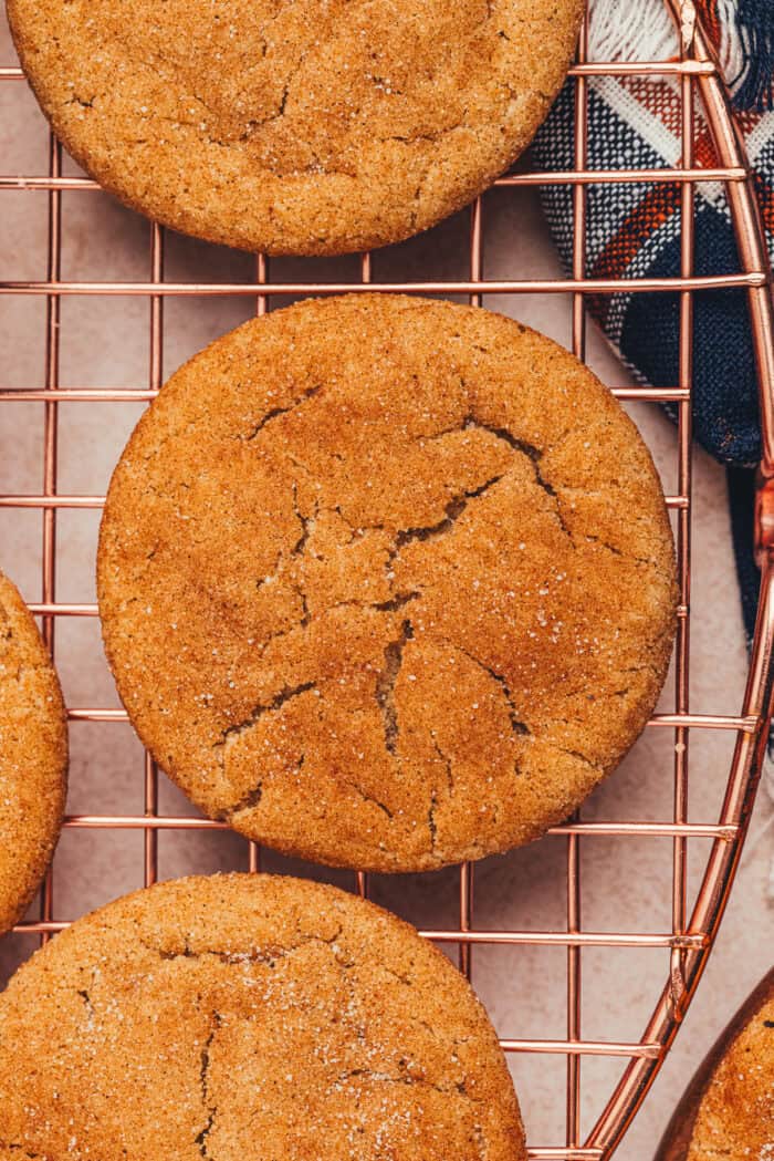 brown butter chai snickerdoodle cookies on a cookie rack