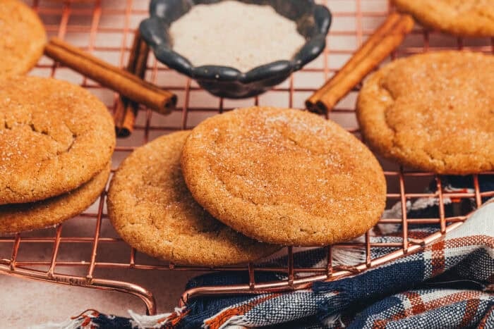 brown butter chai snickerdoodle cookies on a cookie rack