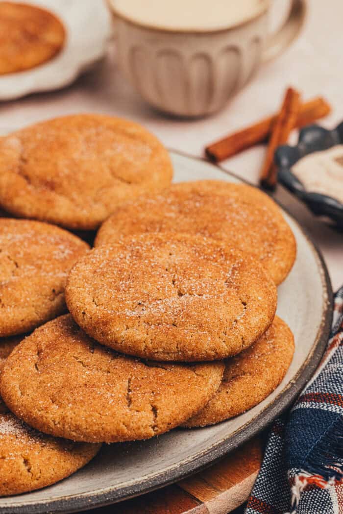 brown butter chai snickerdoodle cookies stacked on a plate