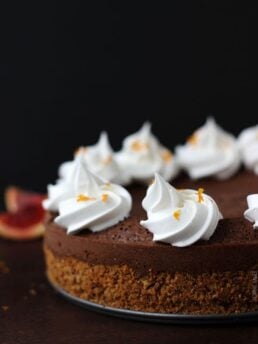Starting with a pecan graham cracker crust, this blood orange chocolate truffle torte is decadent and fudgy with hints of citrus.