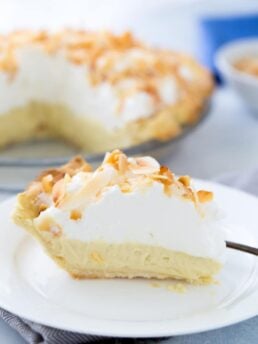 This is your classic coconut cream pie recipe with a sweet silky custard filling rich in coconut flavor. It's the perfect summer pie!