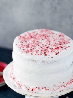 This peppermint layered cake is a holiday special with an airy, light peppermint crunch cake with a sweet peppermint cloud frosting. It's winter perfection.