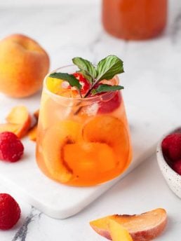 A glass of peach rose sangria.