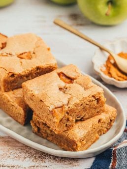 A platter with 4 Apple Blondies on it.