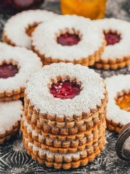 A stack of hazelnut Linzer cookies